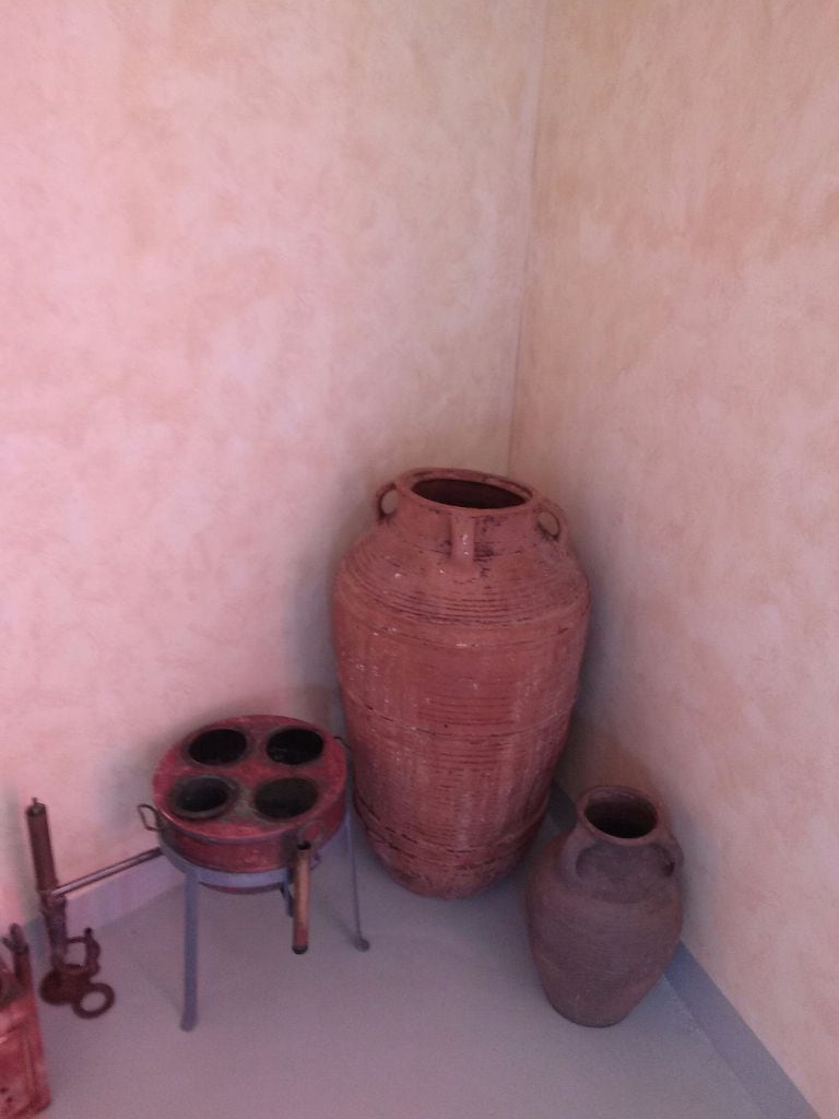 two antique style Greek pottery amphoras at 'Piperis Winery' exhibition area